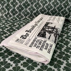 Kate spade newspaper clutch